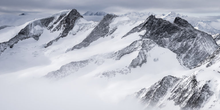 mountain Photo with snow in the bernese alps - black and white picture of Dom des Mischabels and Monte Rosa - wannenhorn and the Fiescher Gabelhorn