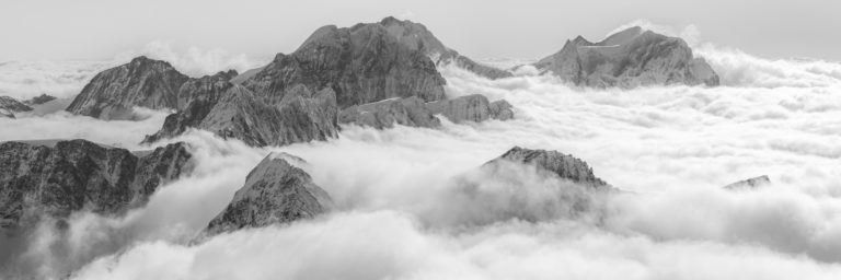 Panoramic image of the Bernina Massif with clouds