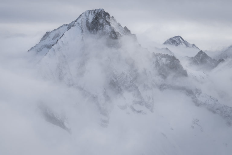 Panoramic mountain landscape pictures  of the Alps - Bietschhorn - Aletschhorn in fog and clouds