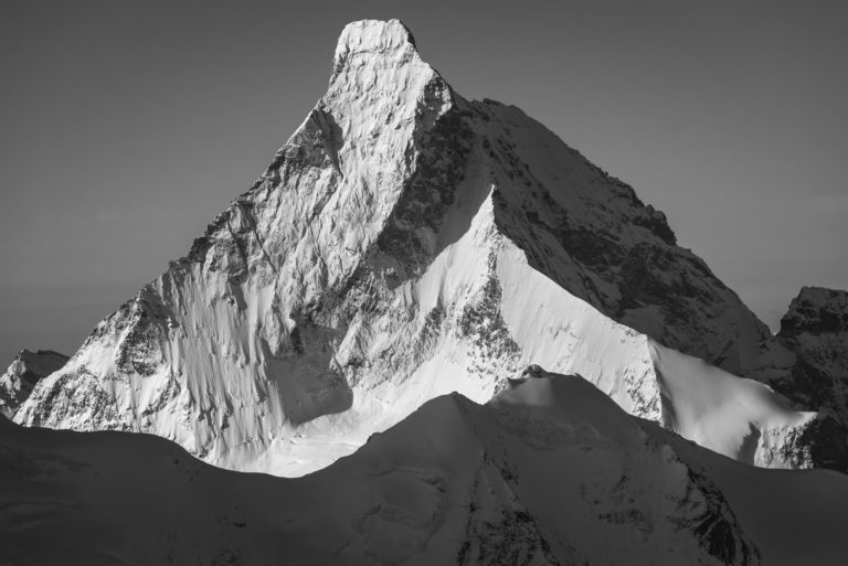 The Matterhorn - snowy mountain picture and rocky mountain massif at Crans Montana in the Alpine Valais of Switzerland