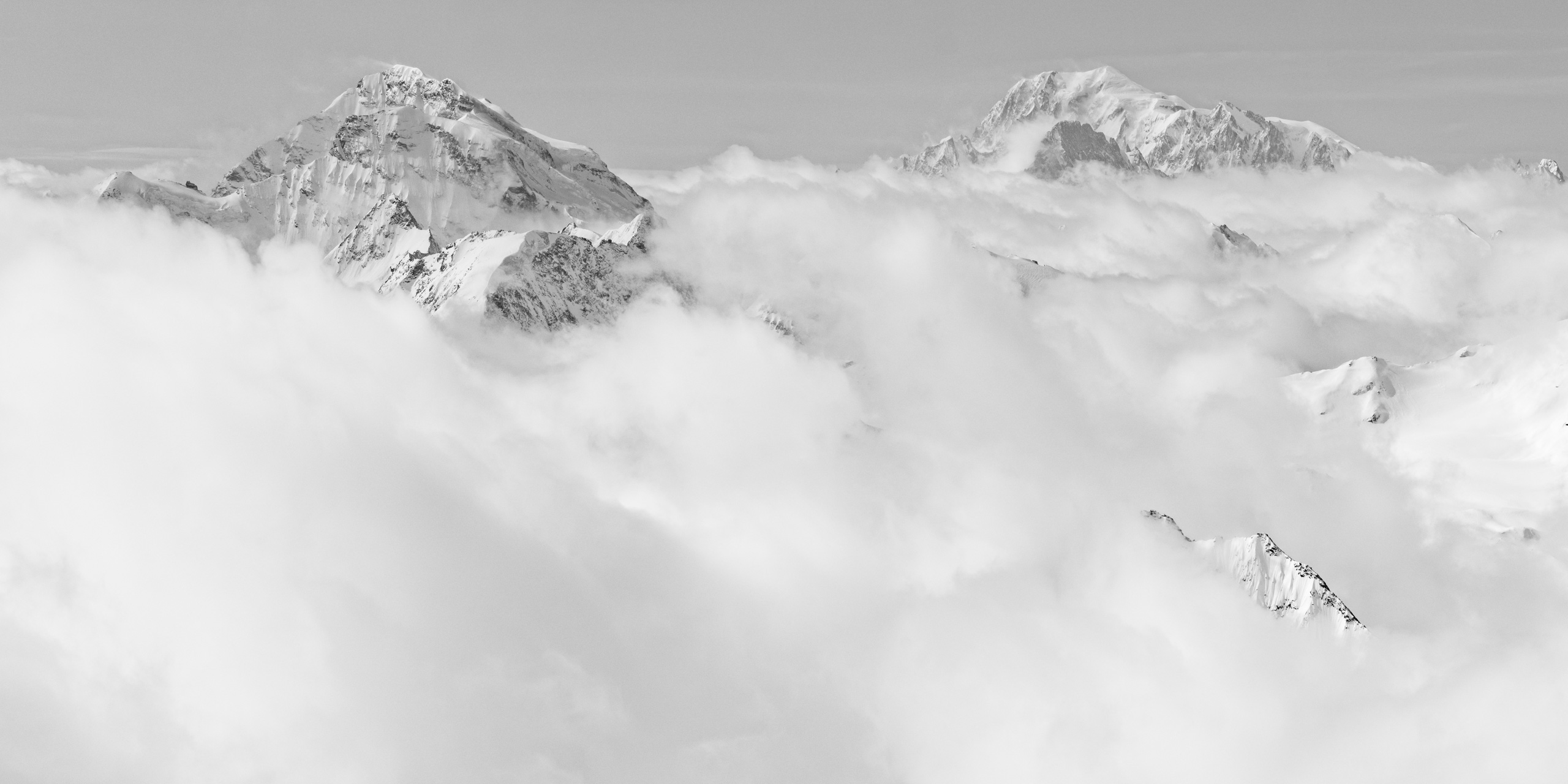 Panorama mont blanc massif - Combin - panoramic flight a bove mont blanc chamonix in the clouds