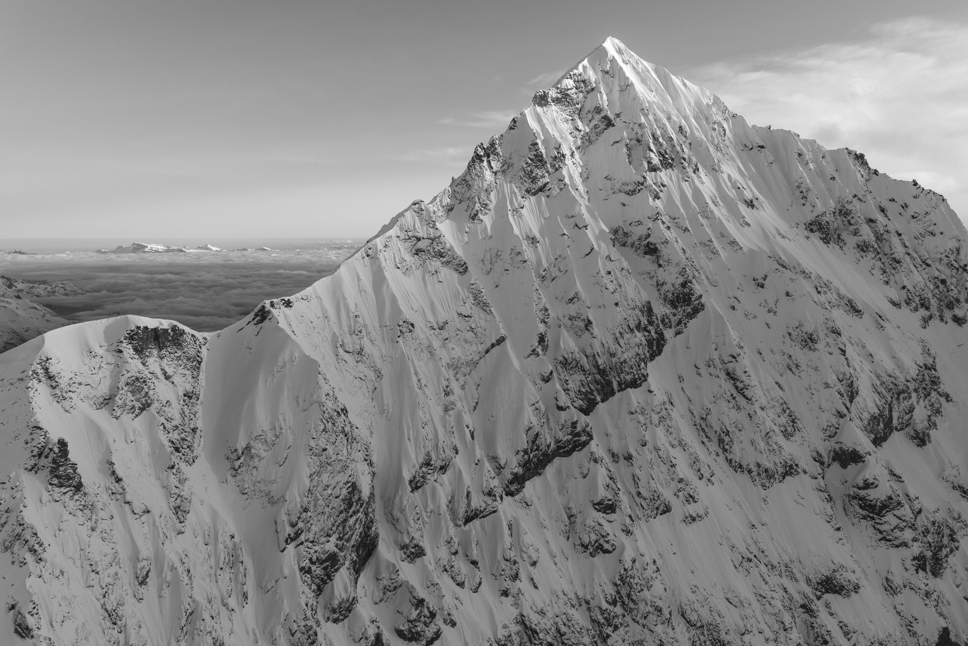 Black and white mountain photo after a storm on The Dent Blanche seen from Zermatt