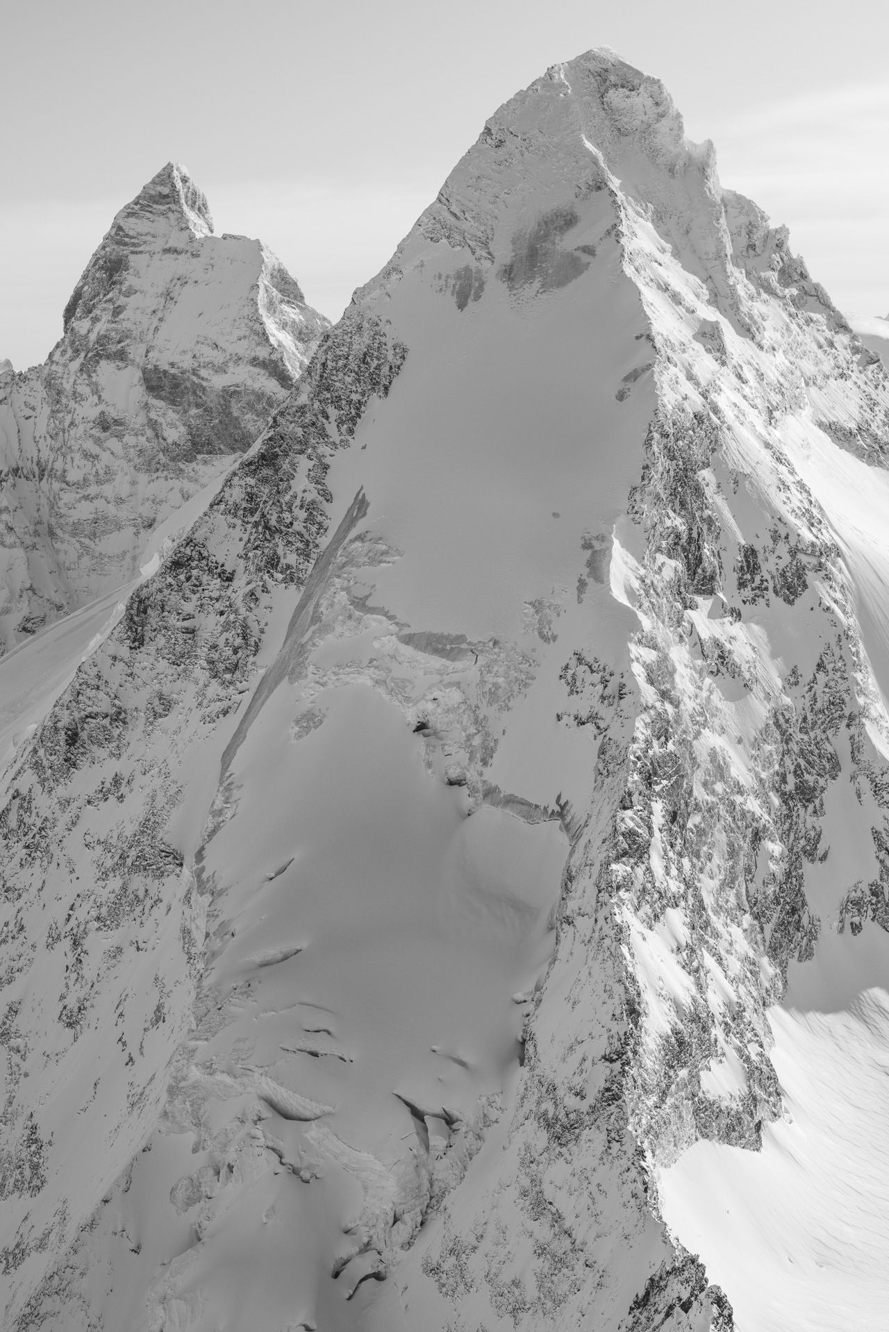 Matterhorn Val d'Hérens - Black and white photo of the Alpine mountains oh Zermatt in Valais - Switzerland