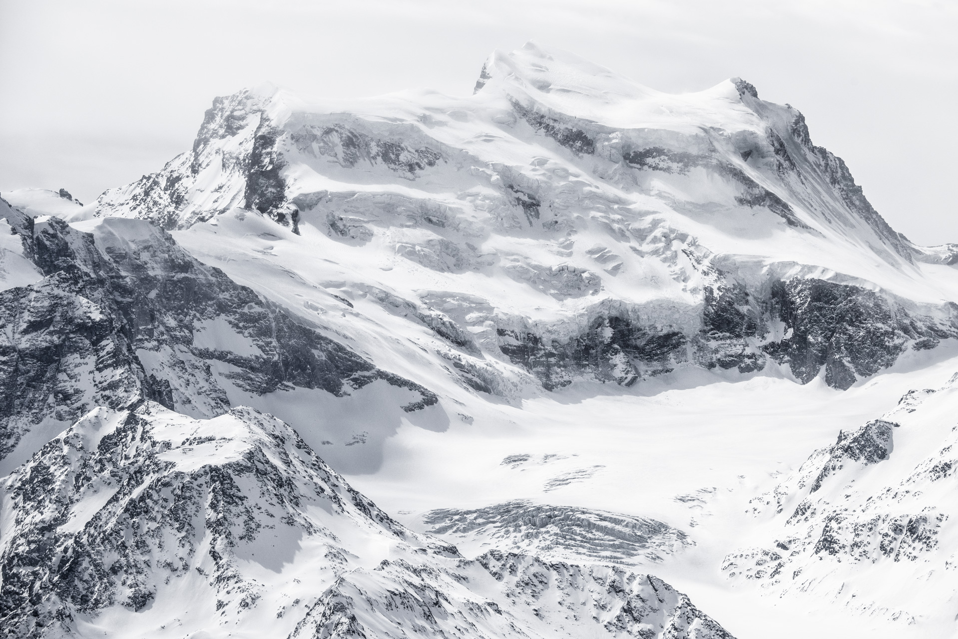 Grand Combin black and white photo - Crans Montana Switzerland - Valley of zermatt Engadine, top of the Valais Alps mountains 