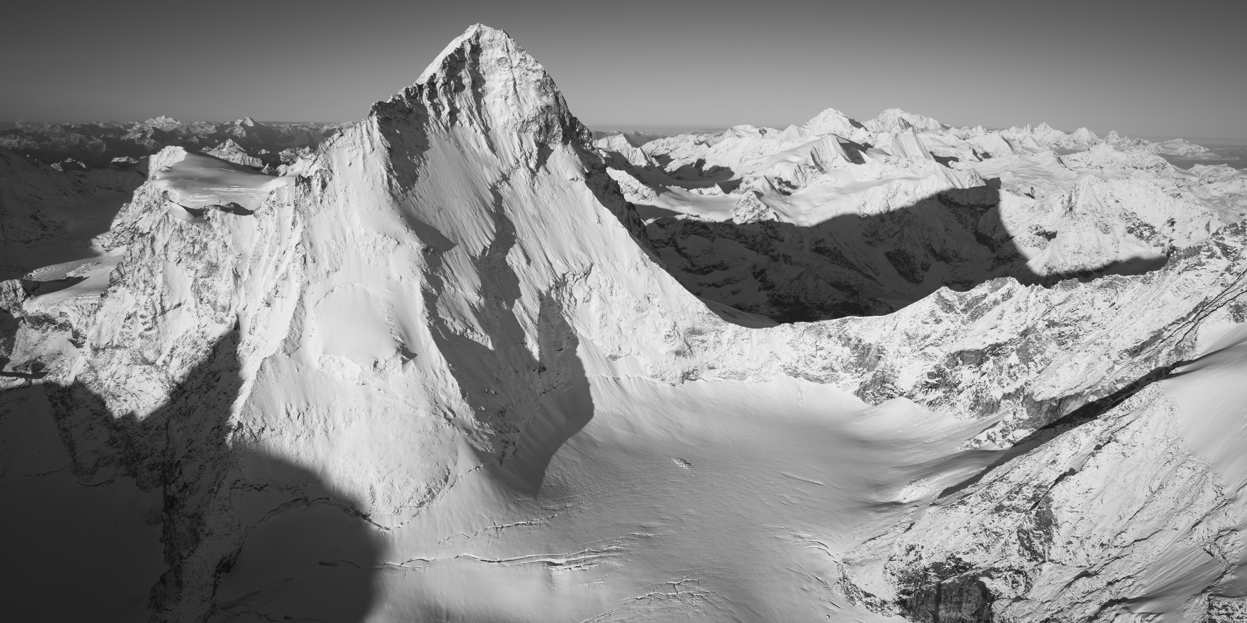 black and white Image of the dent blanche alpine mountain - Shadow of the mountain - summit of mountain