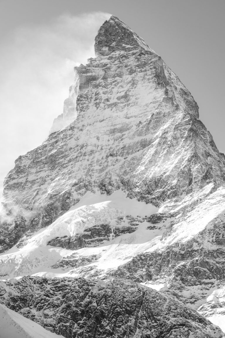 Matterhorn - the most beautiful mountain of Switzerland in the wind and clouds of the Valais Alps