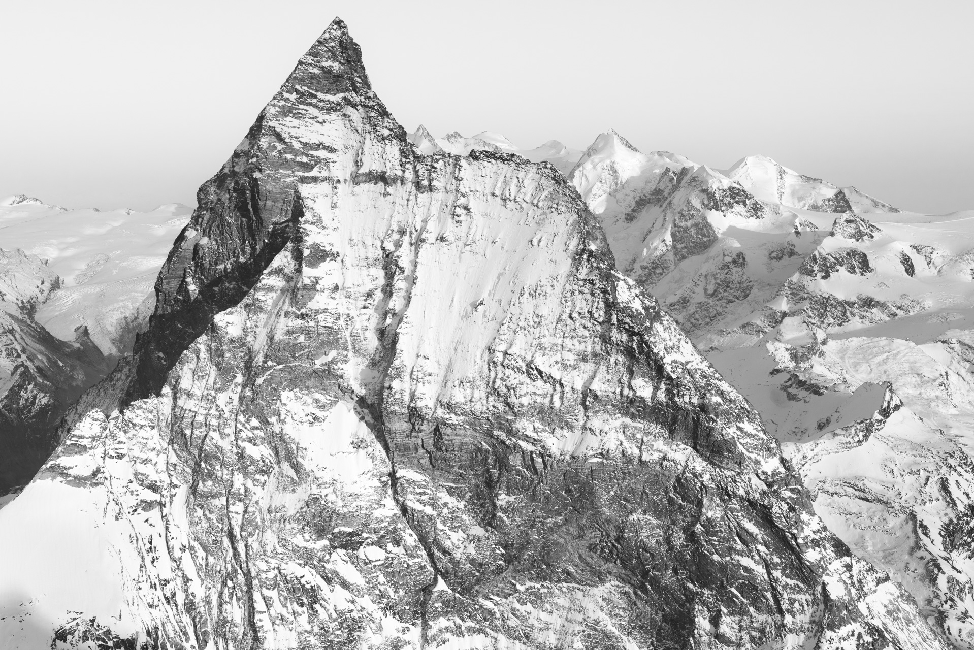The Matterhorn west face - Zermatt black and white photo and Swiss Matterhorn in  and snow covered mountain rock