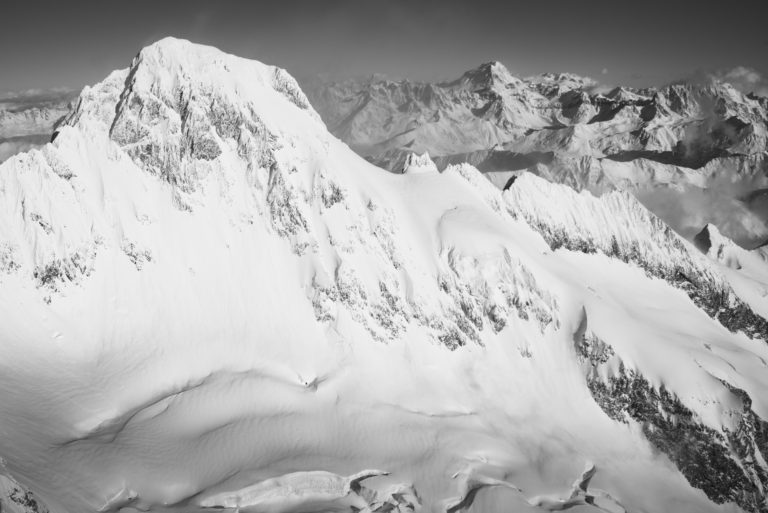 Mont Dolent - black and white photo of Swiss Alpines mountains with a mountain glacier - Grand Combin and verbier