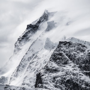 Monte Rosa - Top of snow-covered Monte Rosa in a winter sea of clouds and fog - View on le seracs on the east face of the Monte Rosa Massif