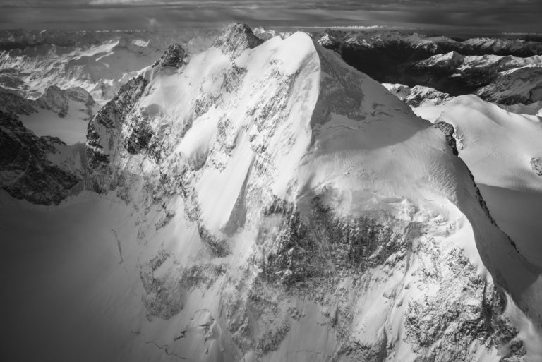 Piz Roseg - helicopter mountain flying in Engadin Davos, swiss alps