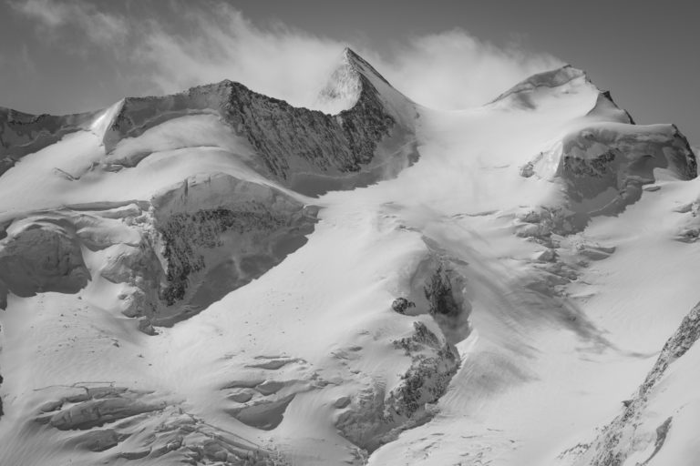 Engadine Grisons Davos - Black and white mountain picture Piz Zupò - Piz Argient Bernina massif, showing the characteristic half-moon ridge, hanging glaciers and snow-covered summits between Switzerland and Italy