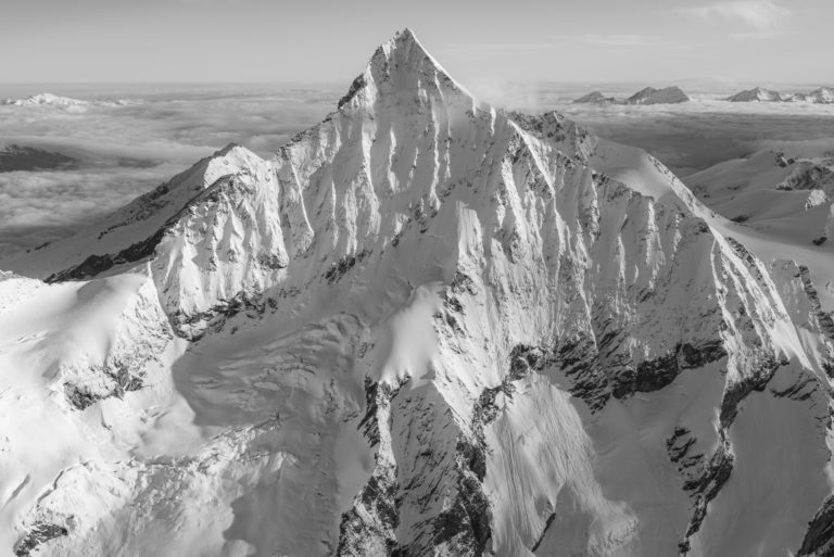 Bernese alps panorama - Black and white photo of mountains in the dark