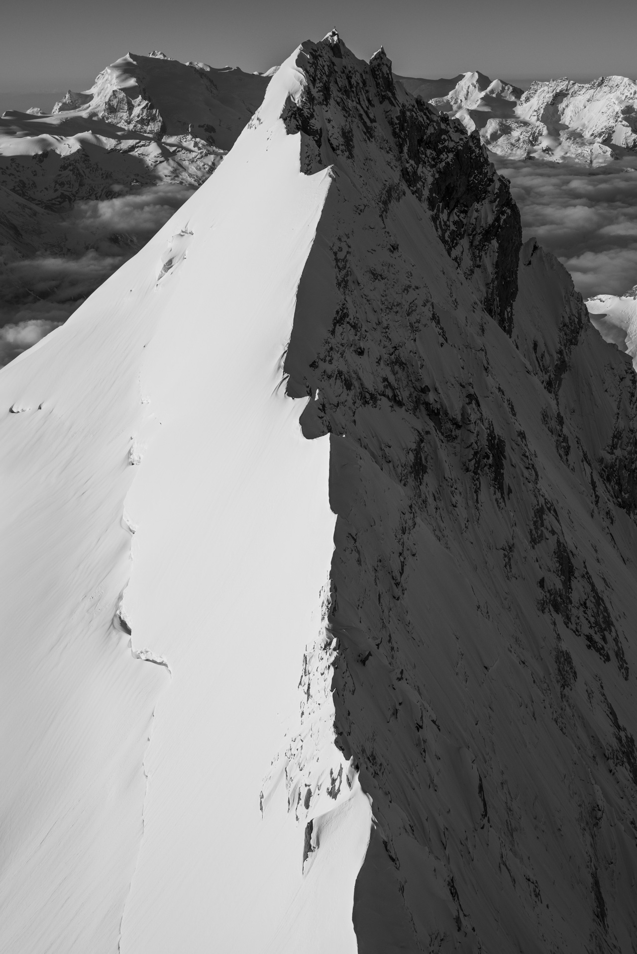 Black and white moutain photo of the northern weisshorn arete
