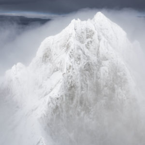 photo swiss mountains winter - sea of clouds in a veil of mist