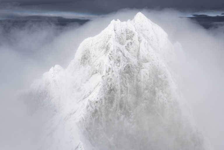 Foto Schweizer Berg Winter - Wolkenmeer in einem Dunstschleier