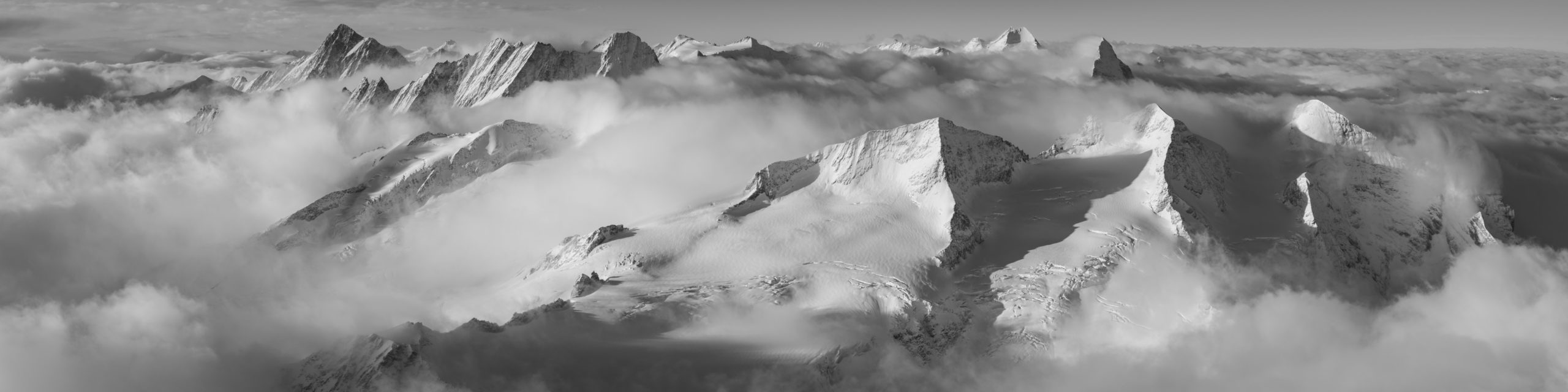 Black and white mountain panorama of Bernese alps in Switzerland