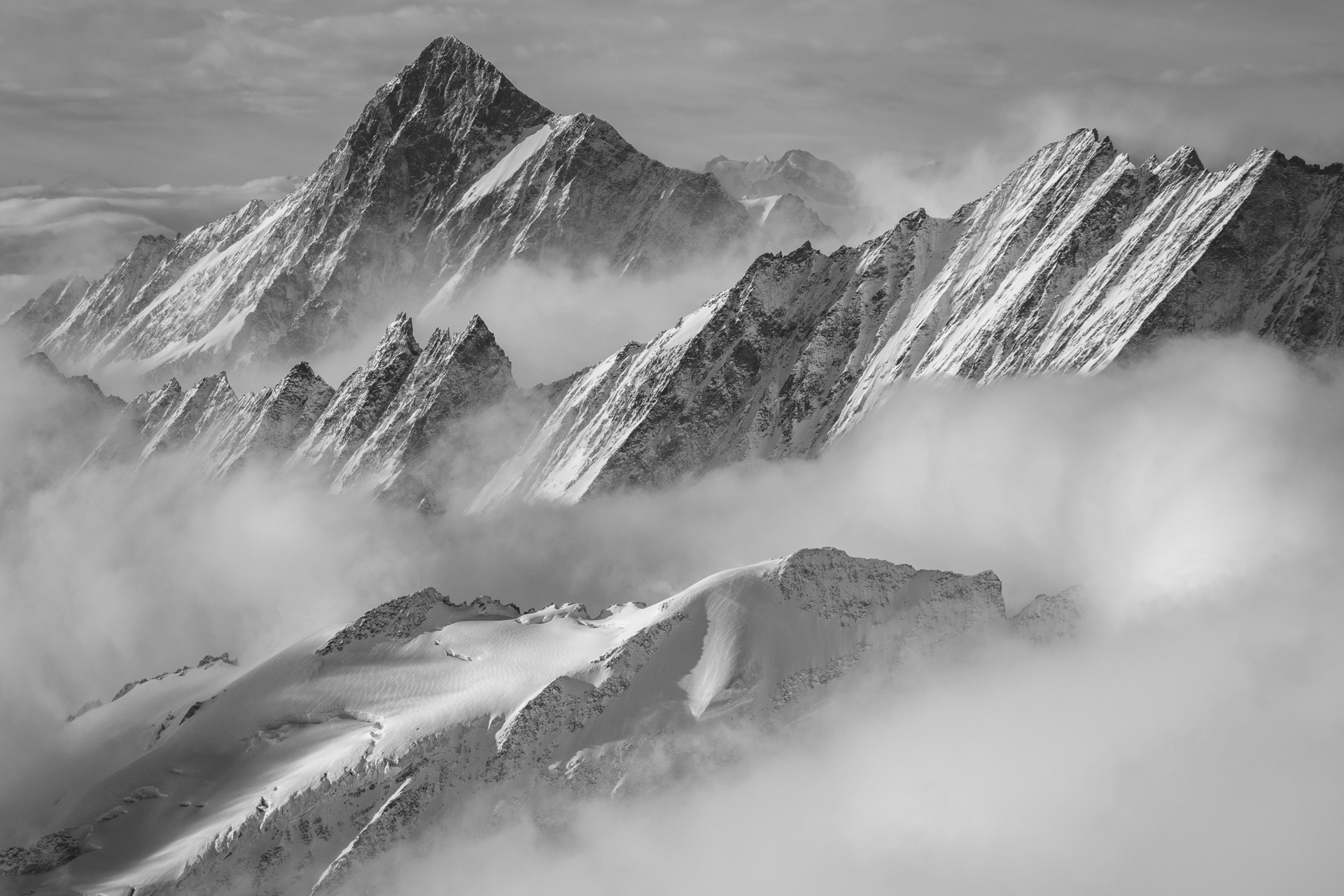Finsteraarhorn - Mountain summit of the bernese alps in black and white