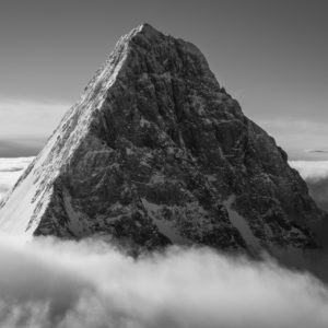Photograph of the Schreckhorn - View of one of the giants of Grindelwald, the Schreckhorn - Portrait of summit emerging from the sea of clouds.