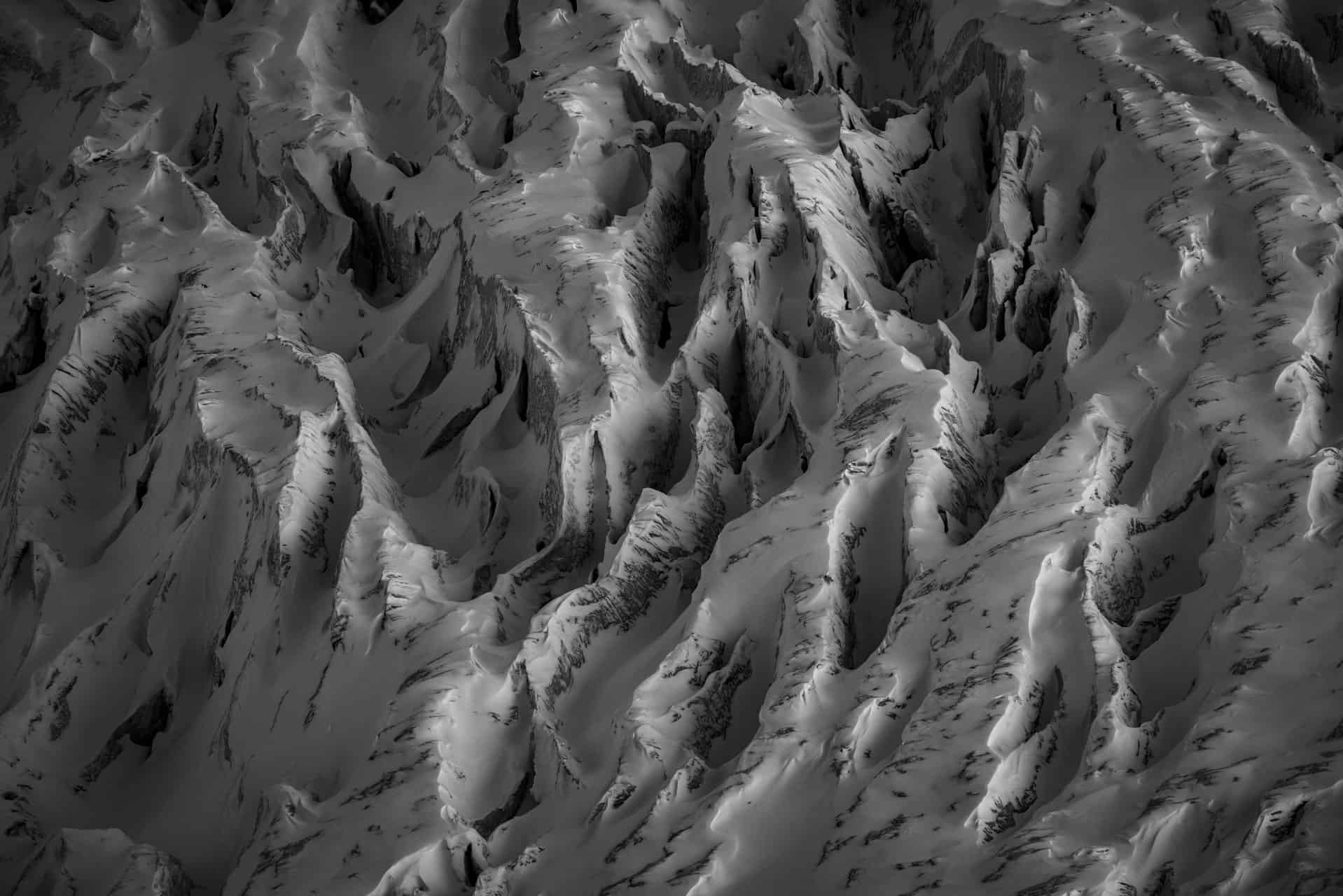 photography of alpine glaciers - abstract crevasses