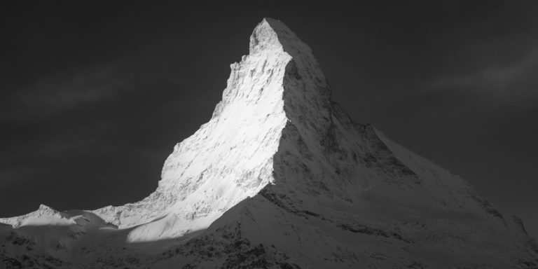 panorama sunrise over the cervin - black and white photo snowy mountain