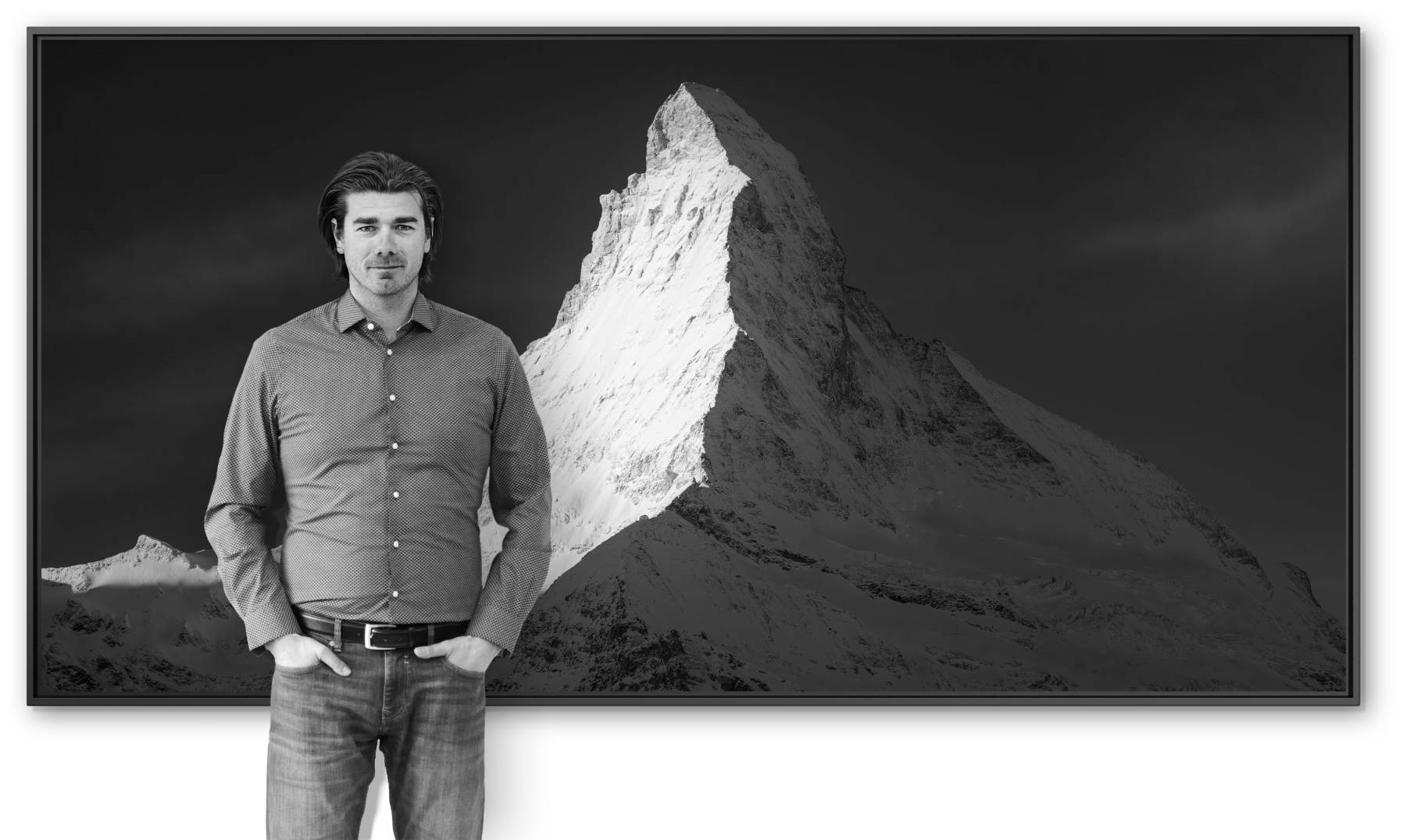 Thomas Crauwels posing in front of one of his prints of the Matterhorn