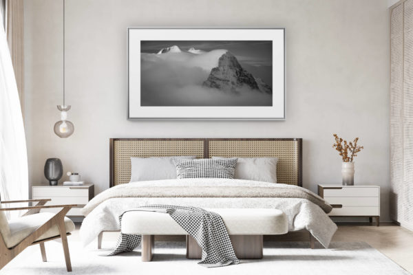 decorating a room in a renovated Swiss chalet - large panoramic mountain photo - Eiger - Monch - Jungfrau - mountain range of the Alps in black and white - Mittellegi stop in the mist