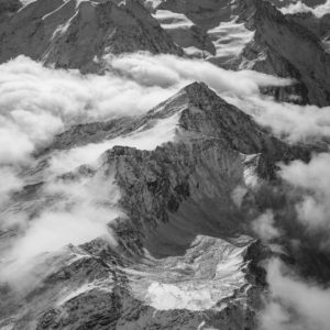 black and white mountain photography - First snows on the Alps