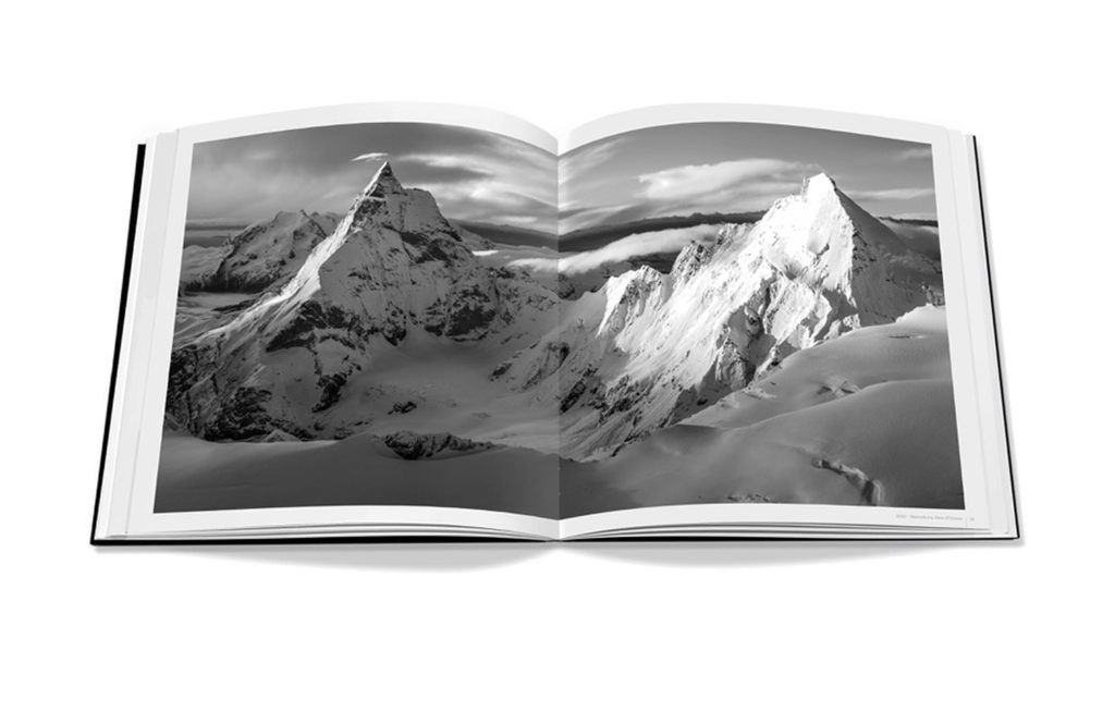 Aperçu du livre Alpine Legacy de Thomas Crauwels, ouvert sur une magnifique photo panoramique