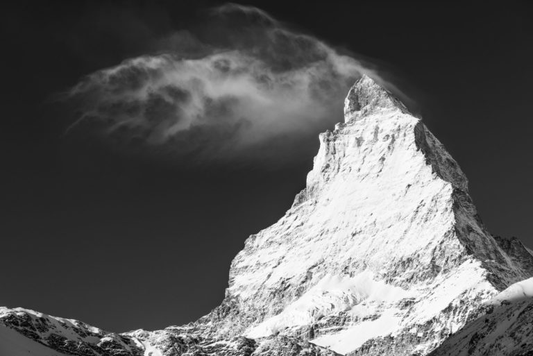 cervin - black and white photograph of the mountain with snow