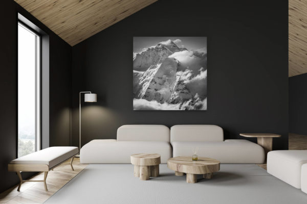 architecte intérieur rénovation chalet suisse - photo montagne grand format - Jungfrau Suisse - le sommet de la montagne des Alpes Bernoises dans une fumée de nuages sous les rayons de soleil