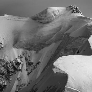 Black and white photograph of Mont Blanc du Tacul with luminous ridge and hanging glaciers, Mont Blanc massif