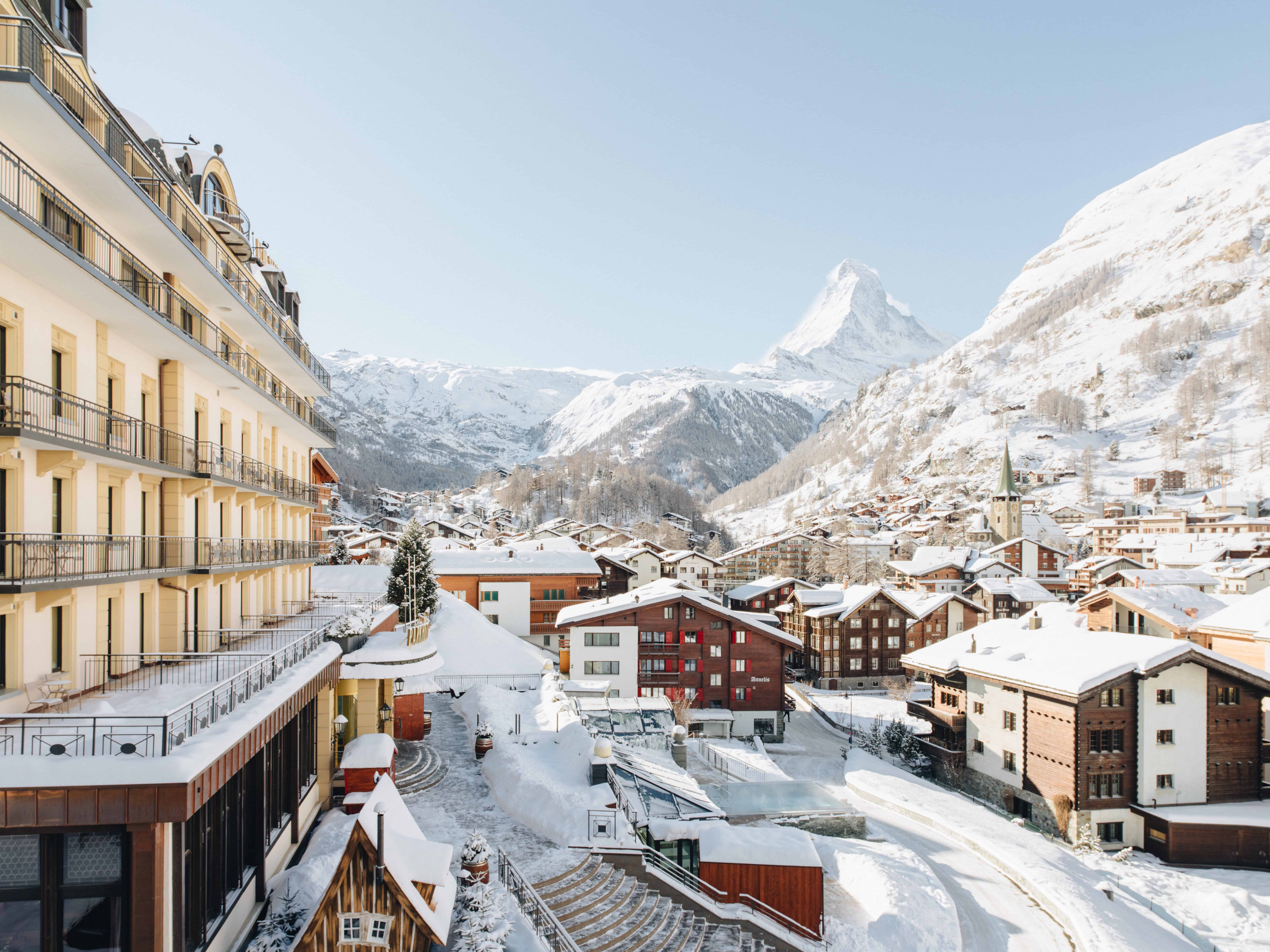 Hotel Beausite Zermatt outside with view of the snow-covered Matterhorn in winter