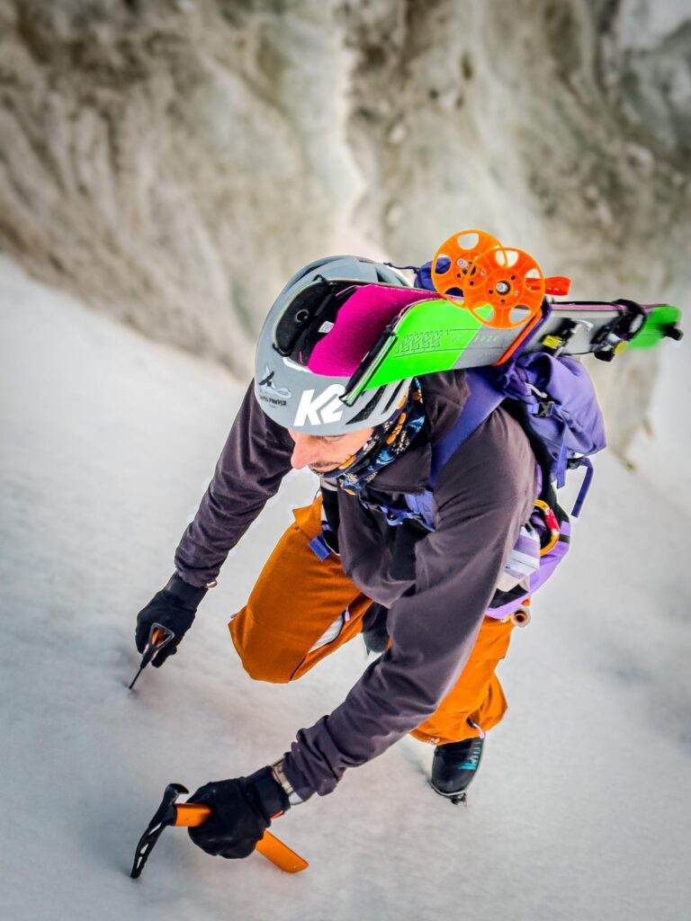 Gilles Sierro on a technical ascent of the Grandes Jorasses, equipped with steep skis.