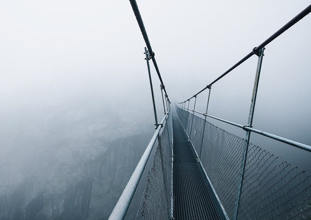The largest suspension bridge in the Alps in the fog