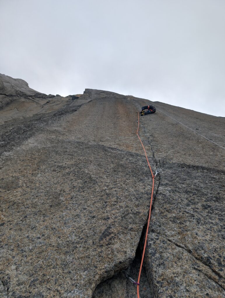Léo Billon on the west face of the Drus, impressive crack
