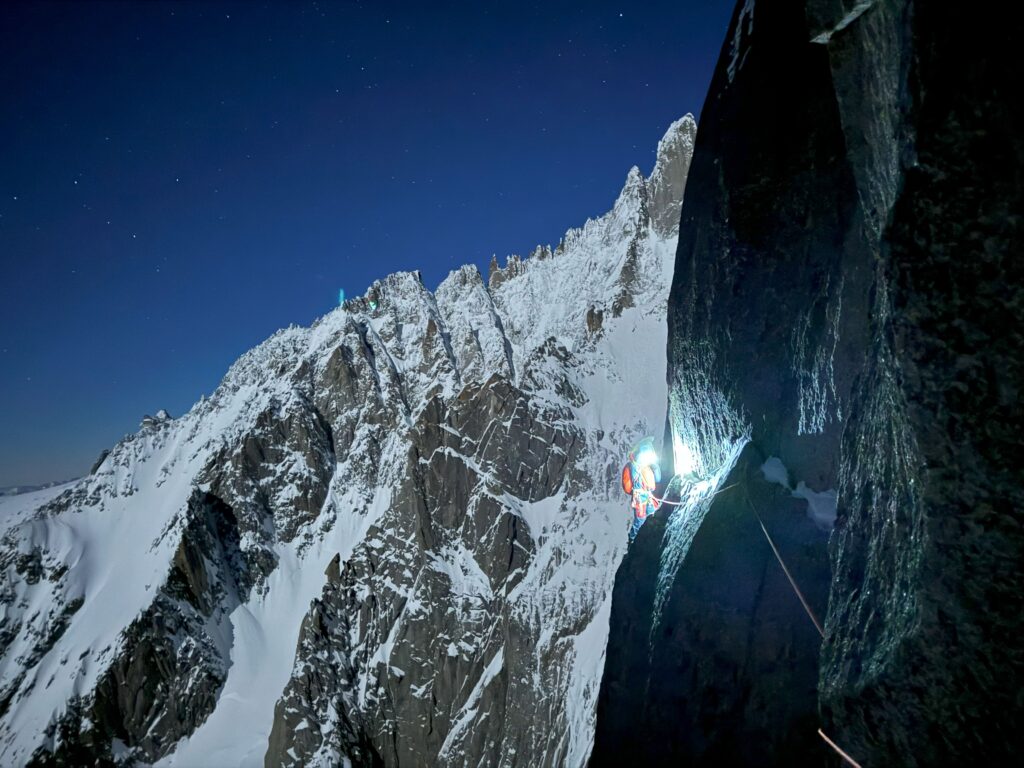Léo Billon, Alpinist on the north face of the Drus at night